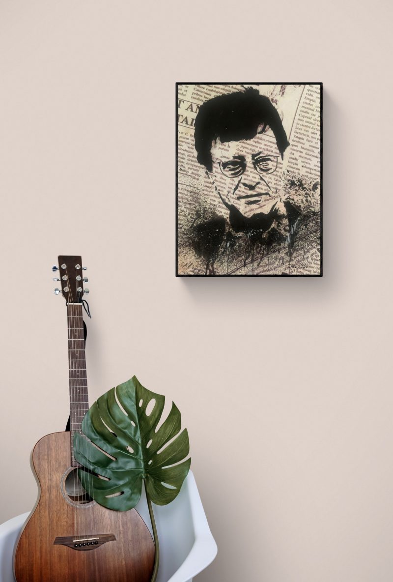 Hand-painted on a newspaper with watercolors, a black and white vintage pop art portrait of Mahmoud Darwish with splashes of graphite.